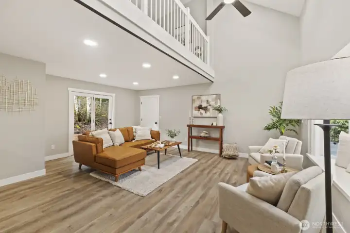 Main living area...with vaulted ceilings and deck access!