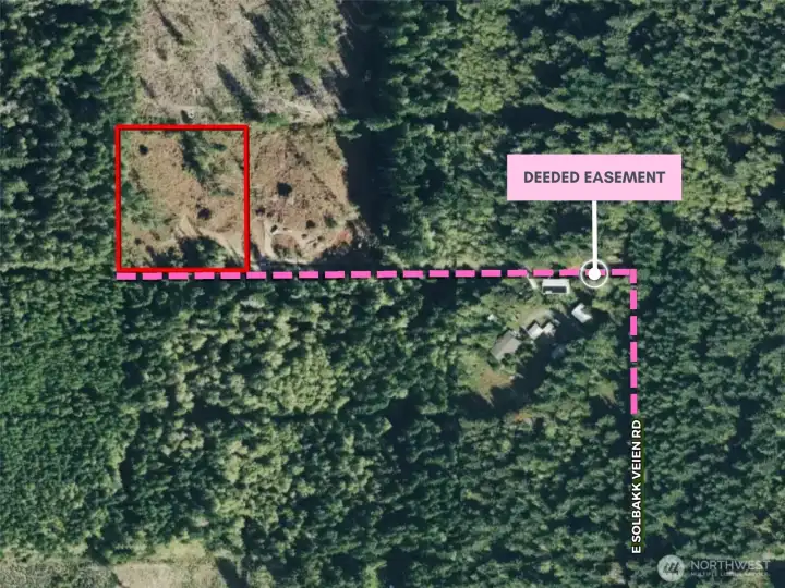 Birdseye view showing easement and subject property in red.