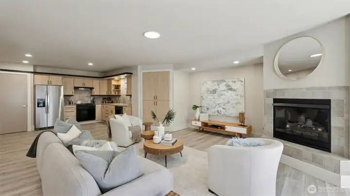 Large basement with kitchen and fireplace.