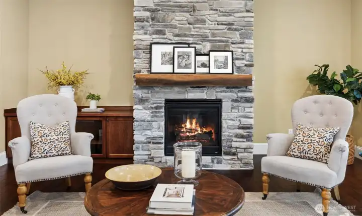 Gas fireplace with custom stone surround and mantle