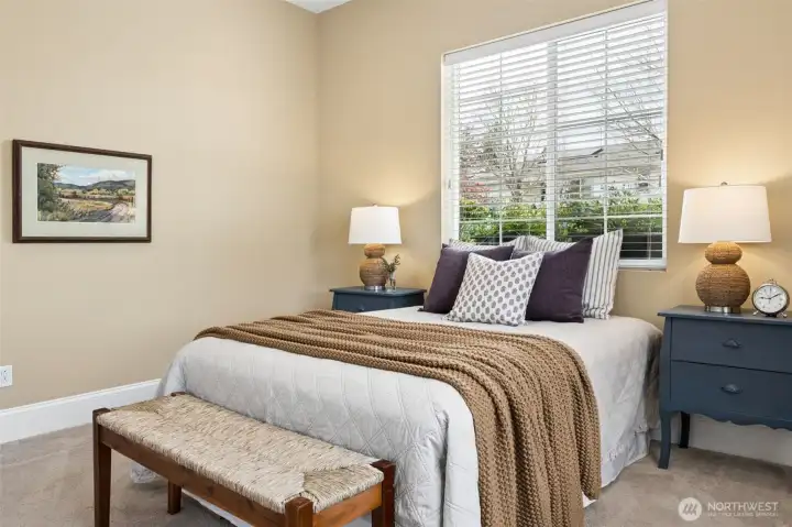 Guest bedroom in separate wing from primary