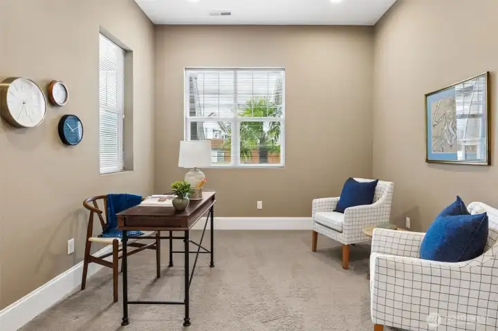 Office/den looks to front of home