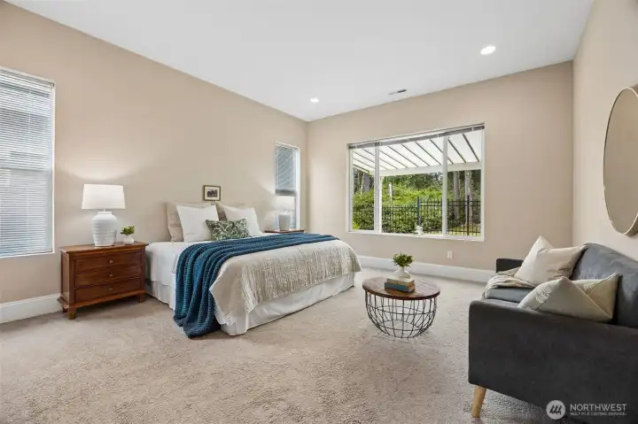 Views to wooded golf course buffer from primary suite