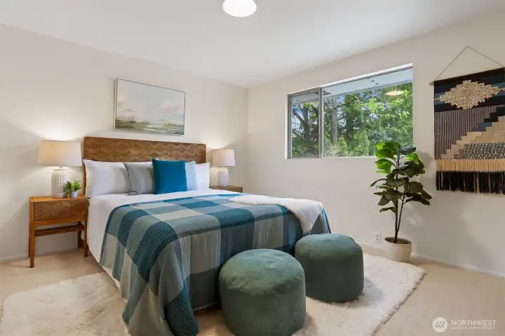 One of 4 bedrooms upstairs.  The rooms are large.