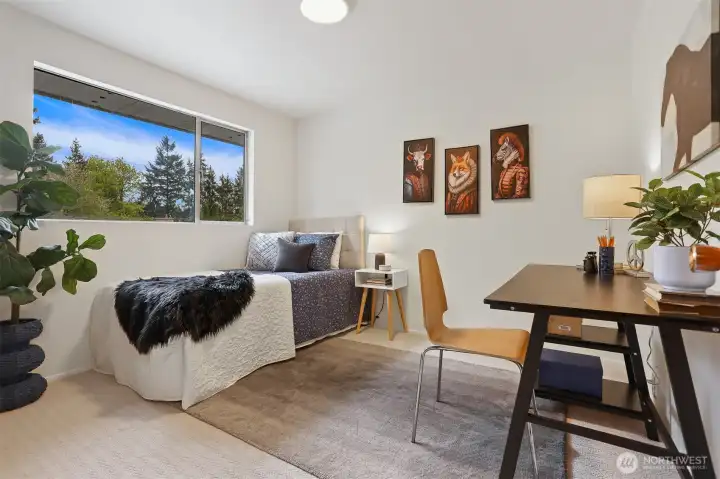 The smallest of the upstairs bedrooms.  Office?