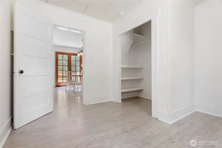 Second bedroom closet with built in shelving Second bedroom closet with built in shelving