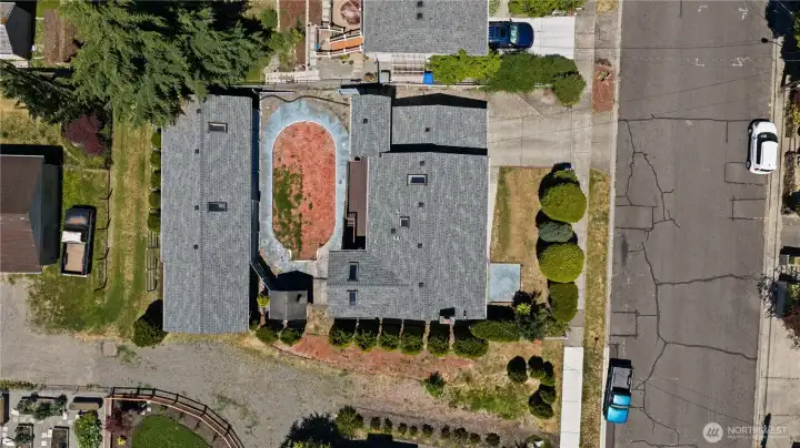 Arial of whole property - large garage to the left, house on the right, deadend alley