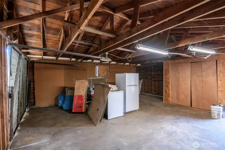 2 car garage just needs a 2nd door for easy parking. Will be empty at closing.