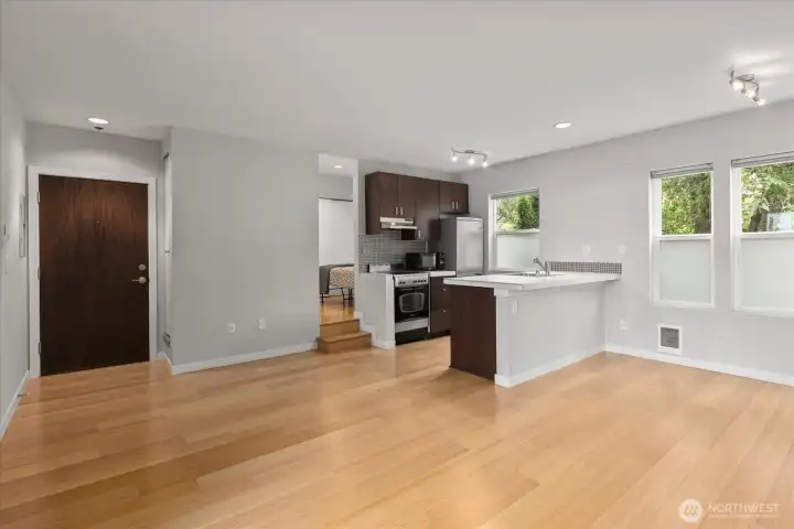 Open concept floorplan allows for maximum use of space. Large windows face quiet tree-lined street (east)