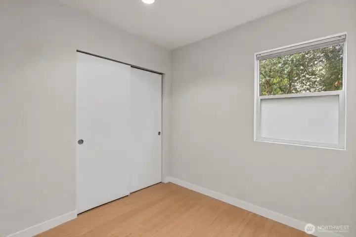Separate bedroom with large storage closet
