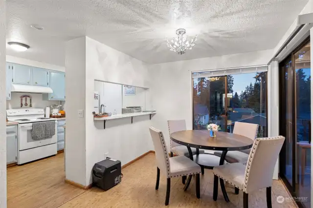 Unit 1 kitchen/Dining area and slider to porch