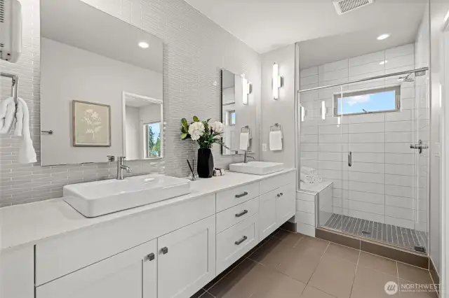 Primary Bath w/ quartz countertops and large shower
