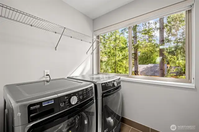 Lots of sunlight in laundry Room