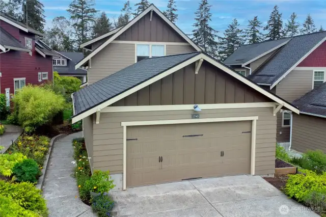 The garage is accessed from Nutkana Way.