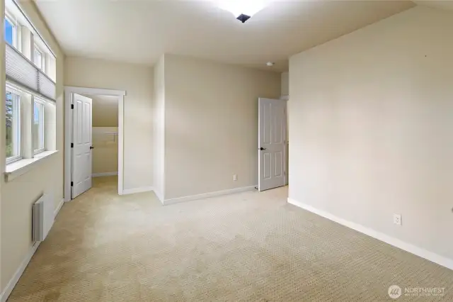One of three upper bedrooms.