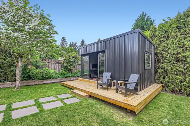Dettached Office is modern and stylish with metal siding and sliding glass doors!