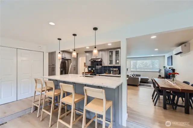 The extensive Kitchen remodel was completed in 2023 and featurs new SS appliances, quartz countertops, tile backsplash & new cabinetry.
