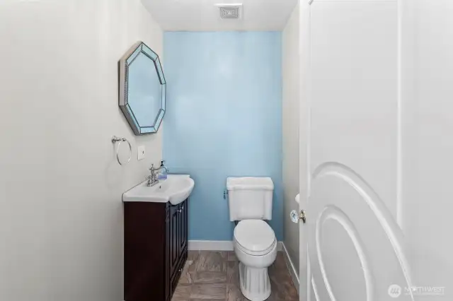 Powder room just off entry