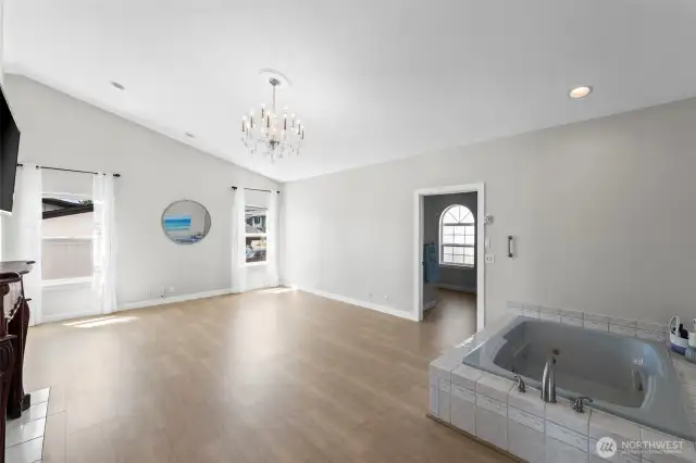 Main floor primary. Sellers designed to enjoy the game whilst in the tub.