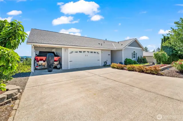 Lots of driveway parking, plus an attached carport!