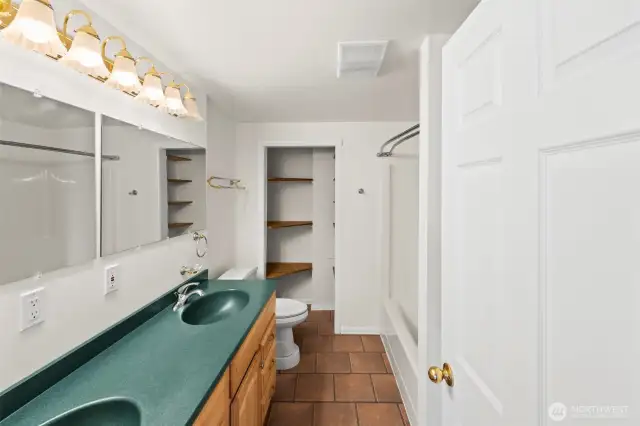 ADU Bathroom w/ stackable laundry