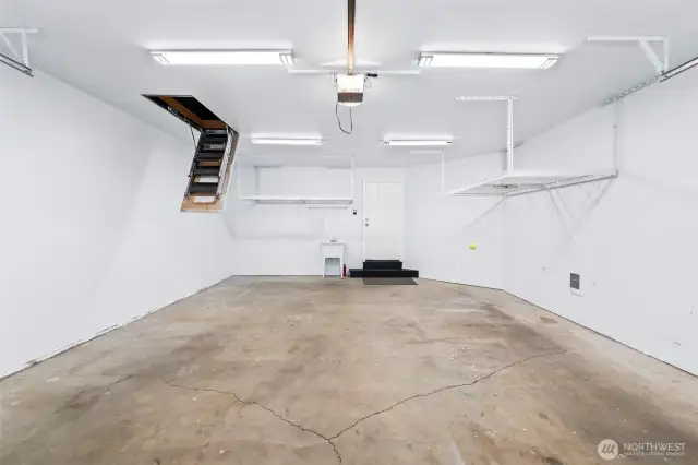 Don't miss the pull down ladder with access to roughed-in man cave! There's also a hidden door to more dry storage.