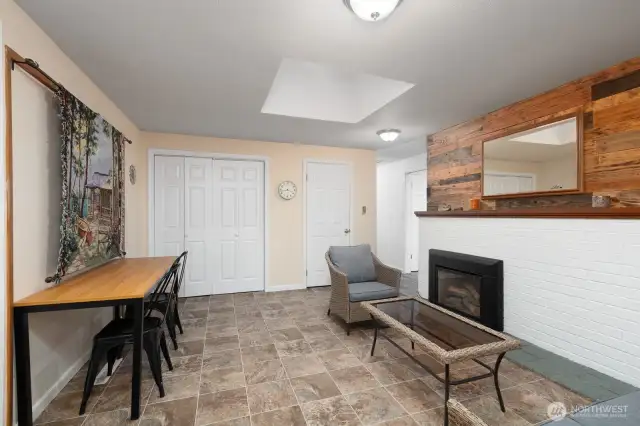Additional sitting/family room featuring fireplace.