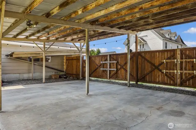 Covered carport-use a covered patio area, or for parking off the alley.