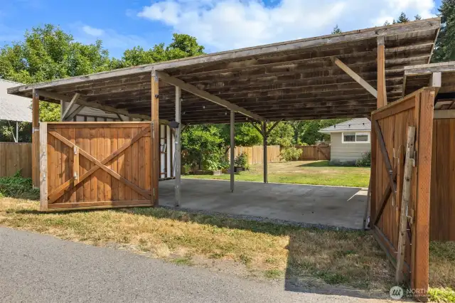 Large gates allow easy access to the back yard.