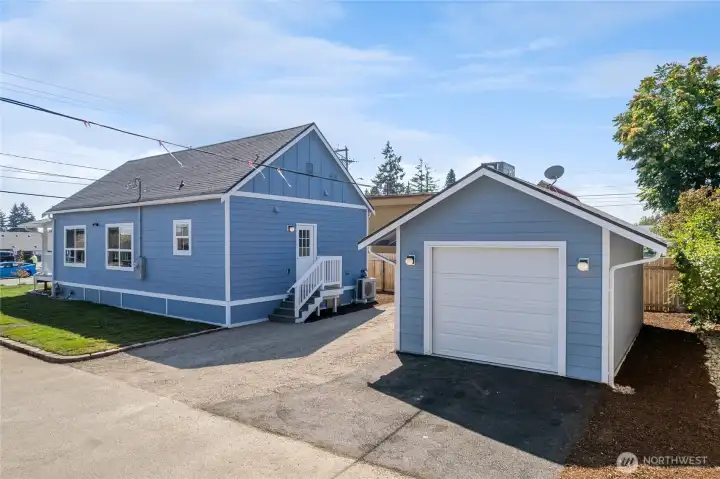 Brand new garage, roof, and siding