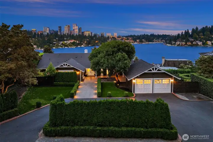 Enjoy a rare opportunity to own a recently remodeled mid-century modern home sited just above Medina’s coveted Gold Coast.
