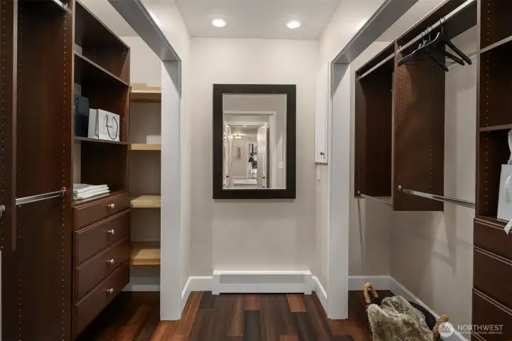 Spacious walk in closet with built-ins.
