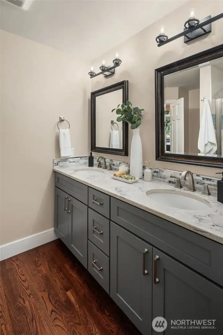 The second main floor bath doubles as a powder room