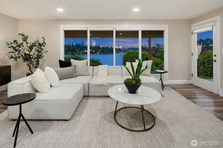 The lower level also offers lake views and features a second family or rec room.