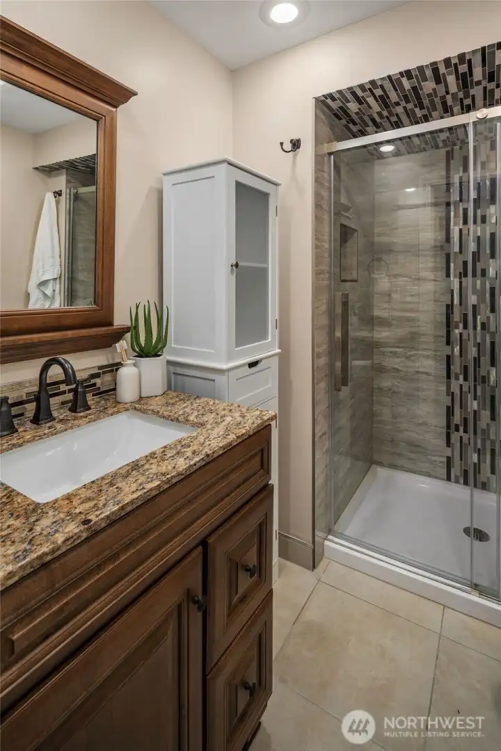 All baths in the home have been remodeled including this 3/4 bath on the lower level.