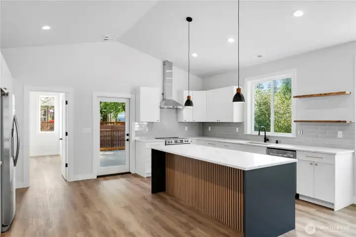 Oversized Island with quartz counters.