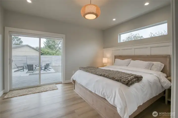 Gorgeous primary suite with access to the covered back deck