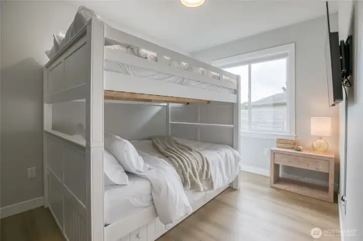 2nd bedroom is perfect for guests, an office or craft room