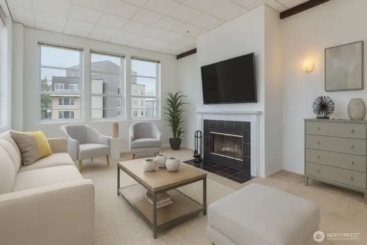 Fall in love with this corner unit, these gorgeous windows say it all. Newer blinds on all will stay. Acoustic ceiling tiles. Virtually staged.