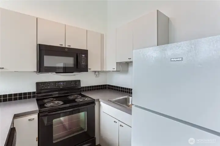 Perfect kitchen with everything you need. Micro and fridge are newer. Virtually staged.