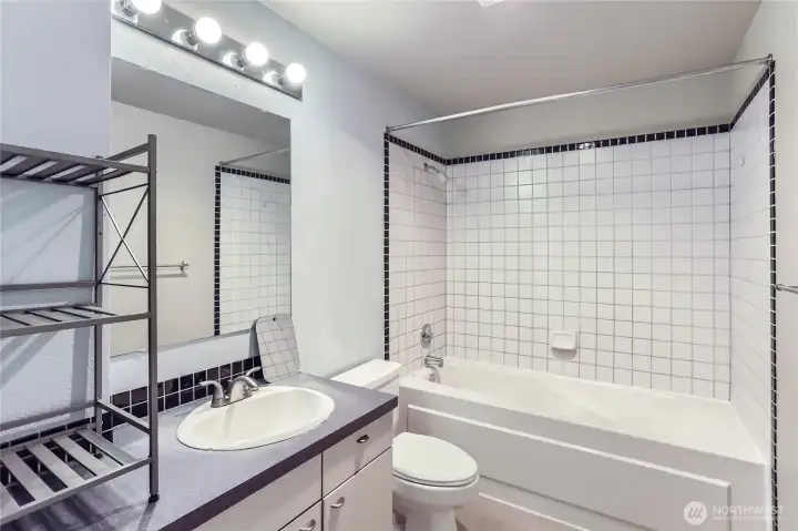 Spacious full bathroom.