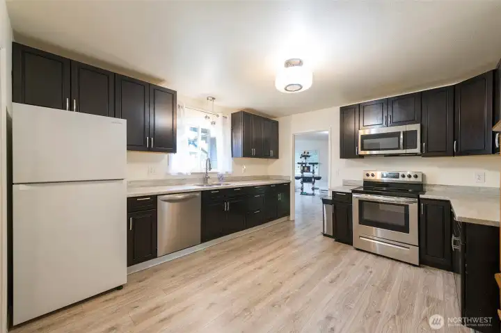 Well-appointed kitchen with granite countertops.