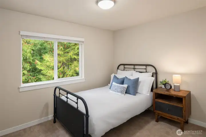 Both 2nd and 3rd bedroom have views of green belt