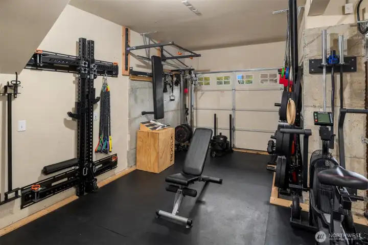 3-car garage w/ ample storage areas & space for home gym, etc.