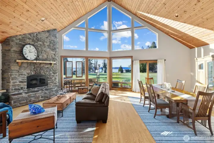 Expansive windows create a bright, refined atmosphere with water & mountain views.