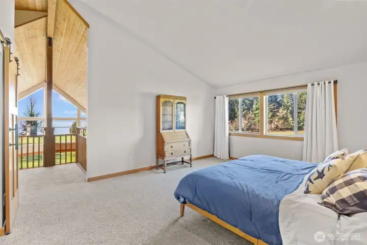 Unwind in the luxurious primary suite with vaulted ceiling, views, 5-piece ensuite