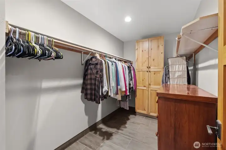Walk-in closet with plenty of space and room to stay organized.