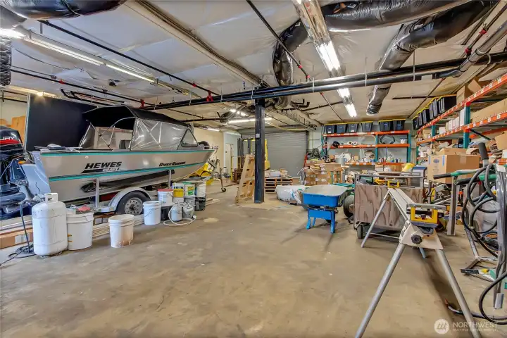 Shop has roll up door for vehicle access as well.