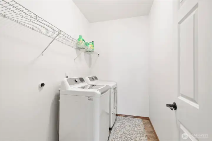 Generous size utility room with new washer and dryer
