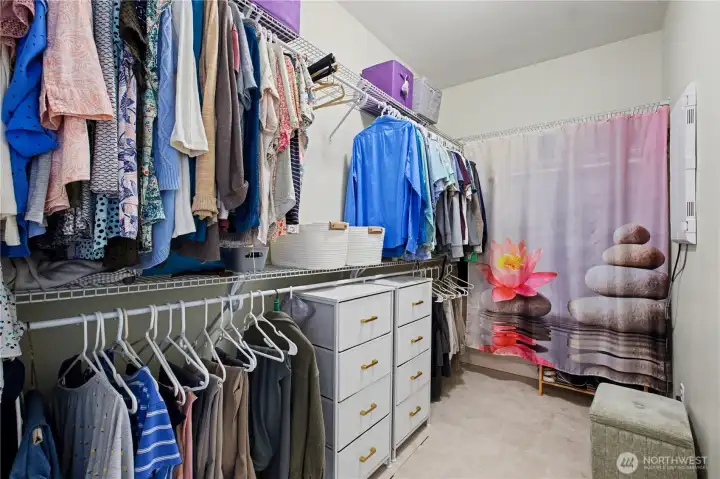 Primary walk-in closet just off of the bathroom